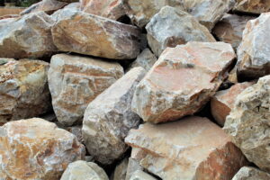 What is a Boulder Wall, and How is it Installed? Boulders for boulder wall landscape construction project in Park City, UT